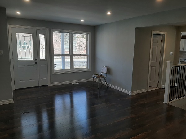 finished livingroom renovation new floors doors and windows