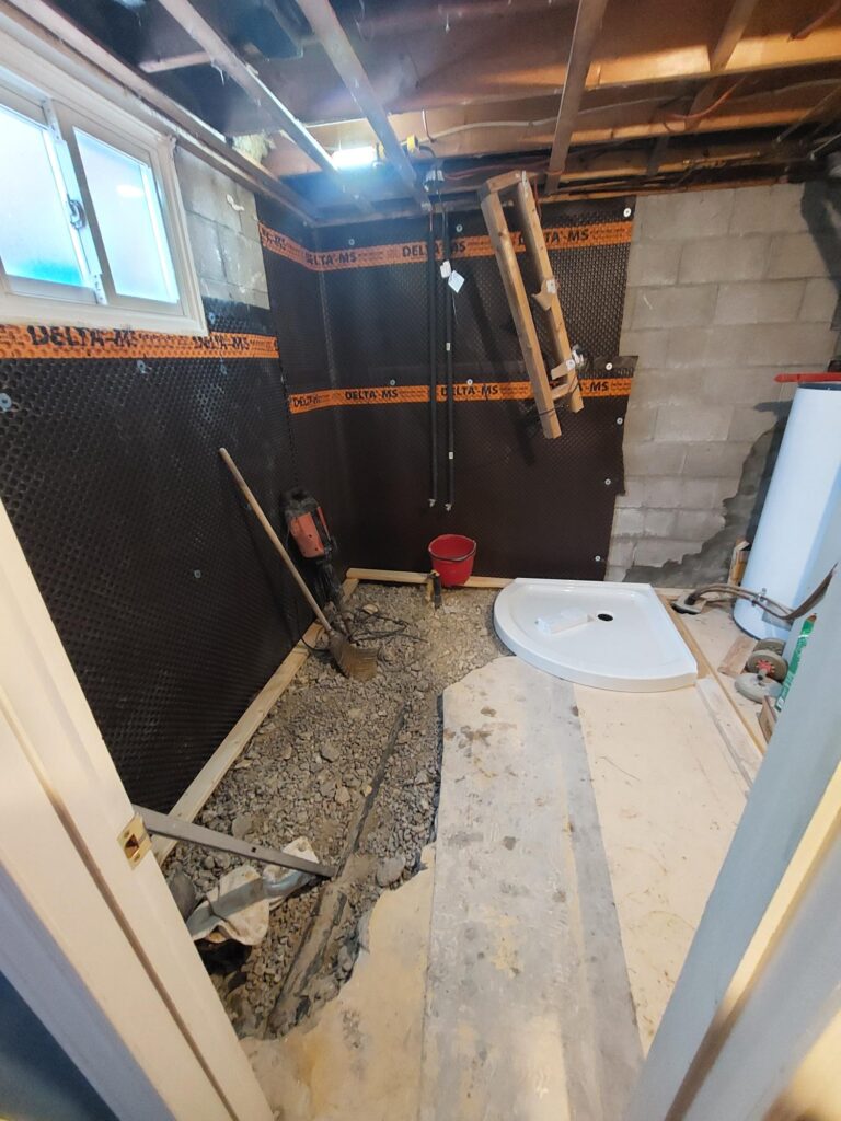 This shows the beginning of a basement bathroom